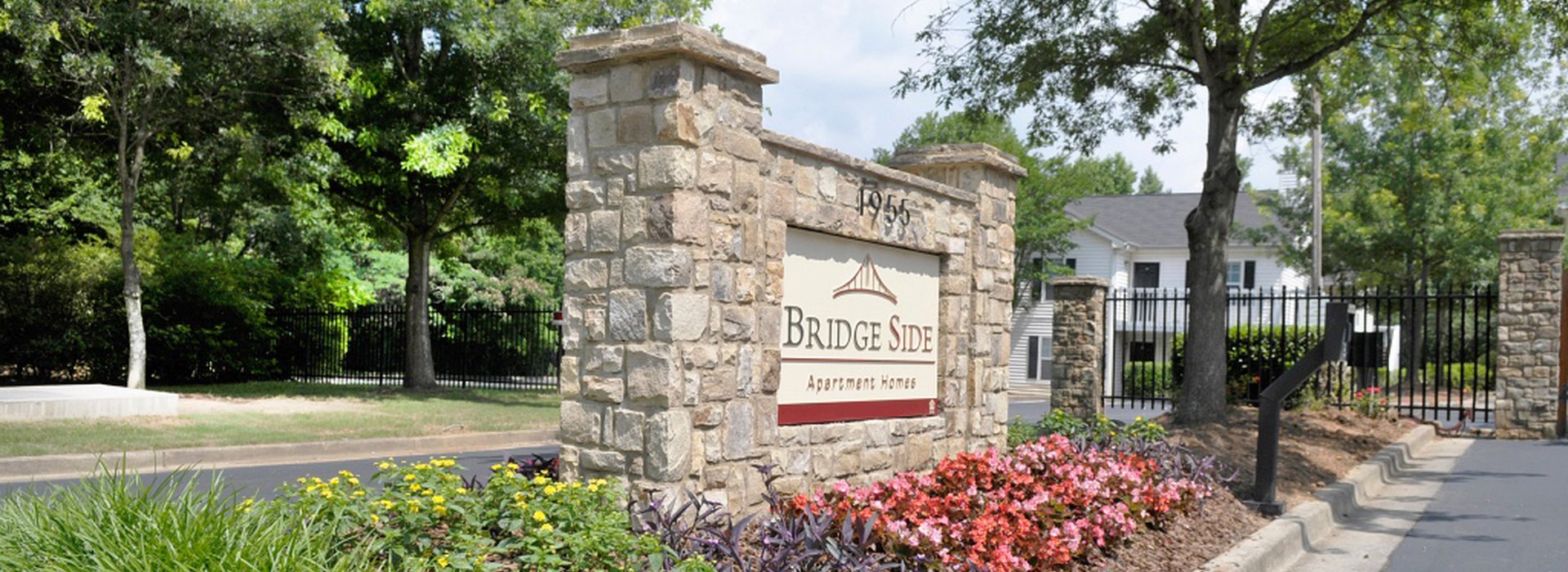 Bridge Side Apartments sign